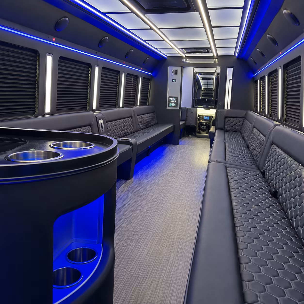 Wedding guests seated inside a party bus serving Tampa
